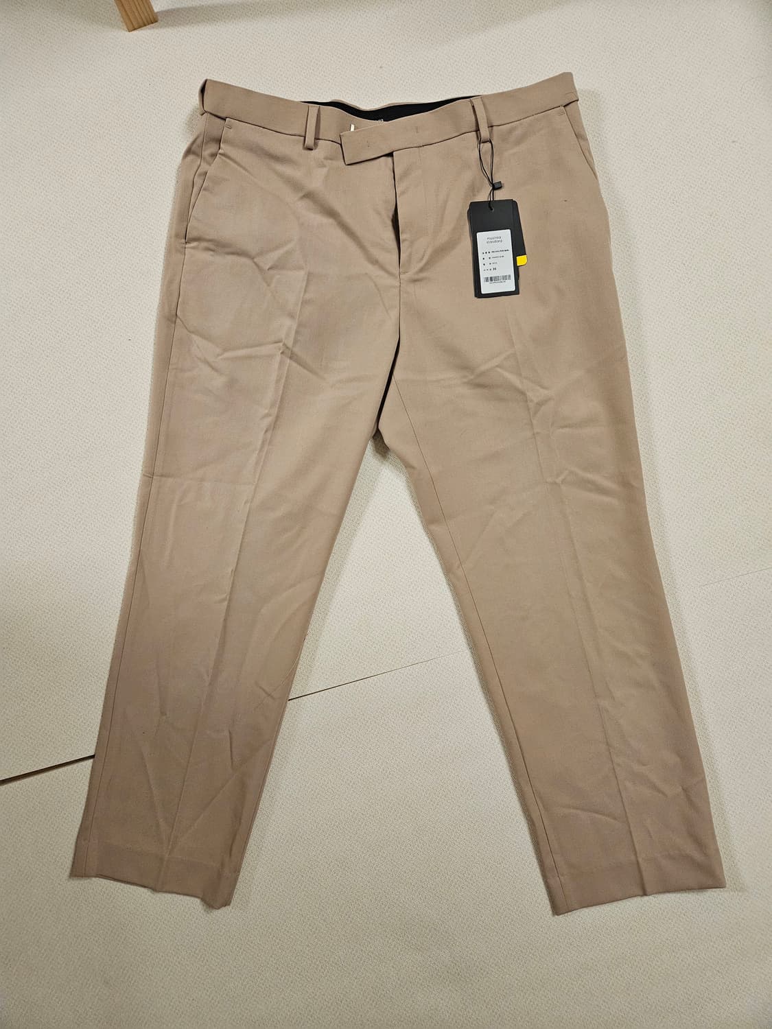 무신사 릴렉스드 테이퍼드 히든 밴딩 크롭 슬랙스 [베이지] 상품이미지1