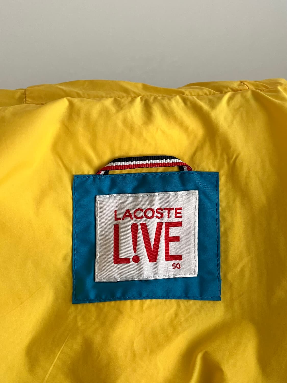 100) 라코스테 덕다운 패딩조끼 아쿠아블루 상품이미지7