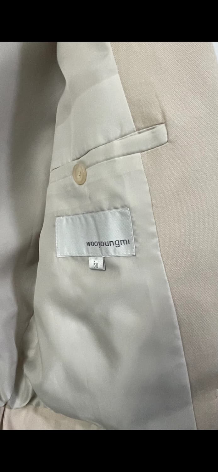 [WOOYOUNGMI] Asymmetric Hem Cropped Tail 상품이미지7