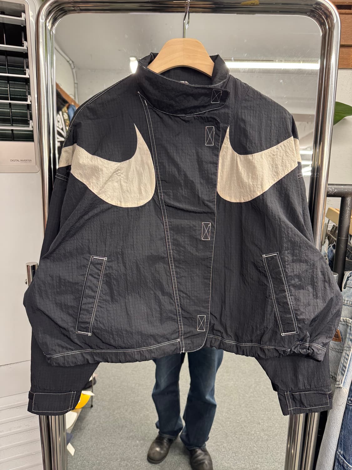 나이키 스우시 여성 리펠 우븐 자켓 상품이미지1