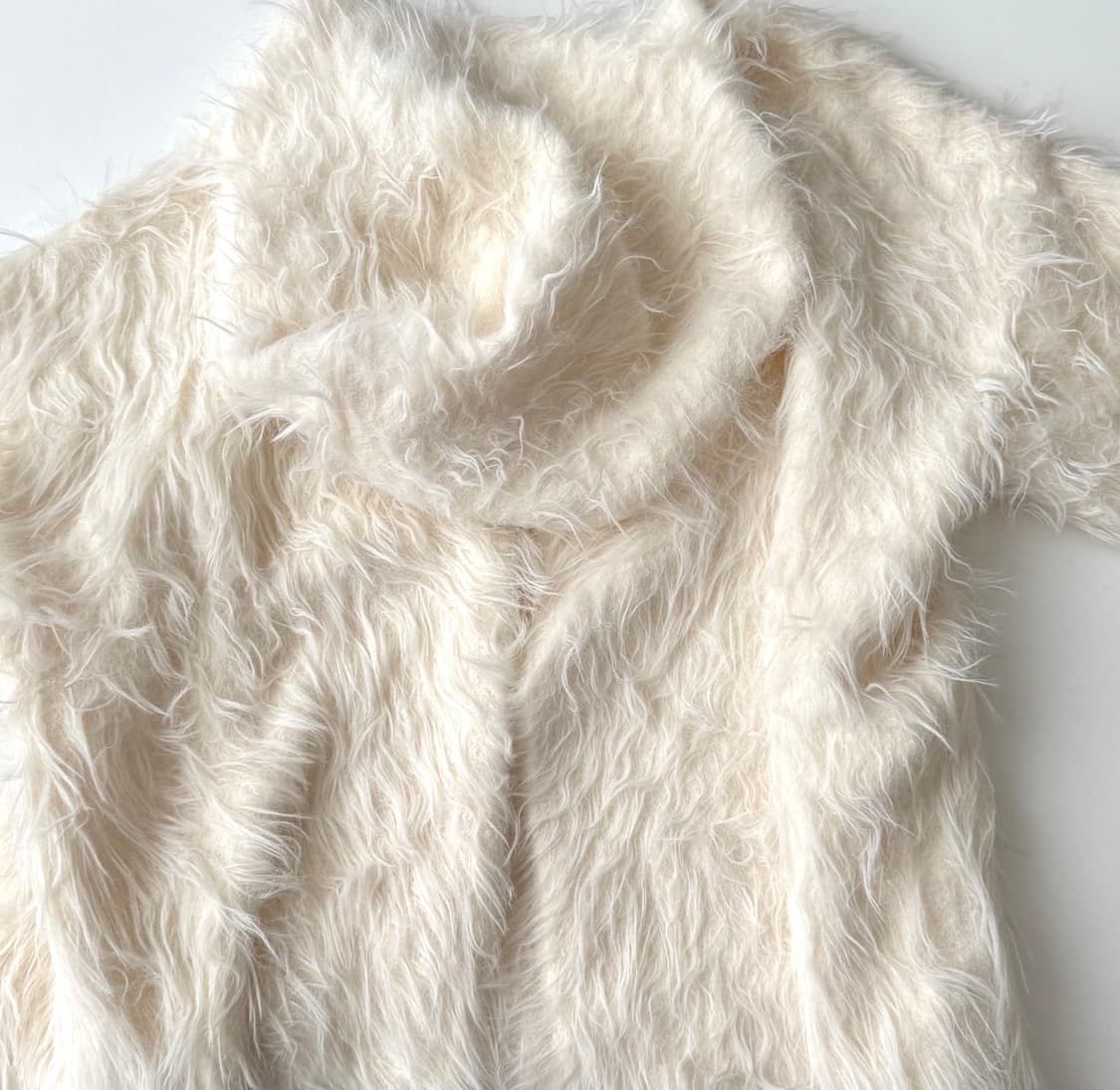 아이보리 루즈핏 퍼 깃털 가디건 상품이미지6