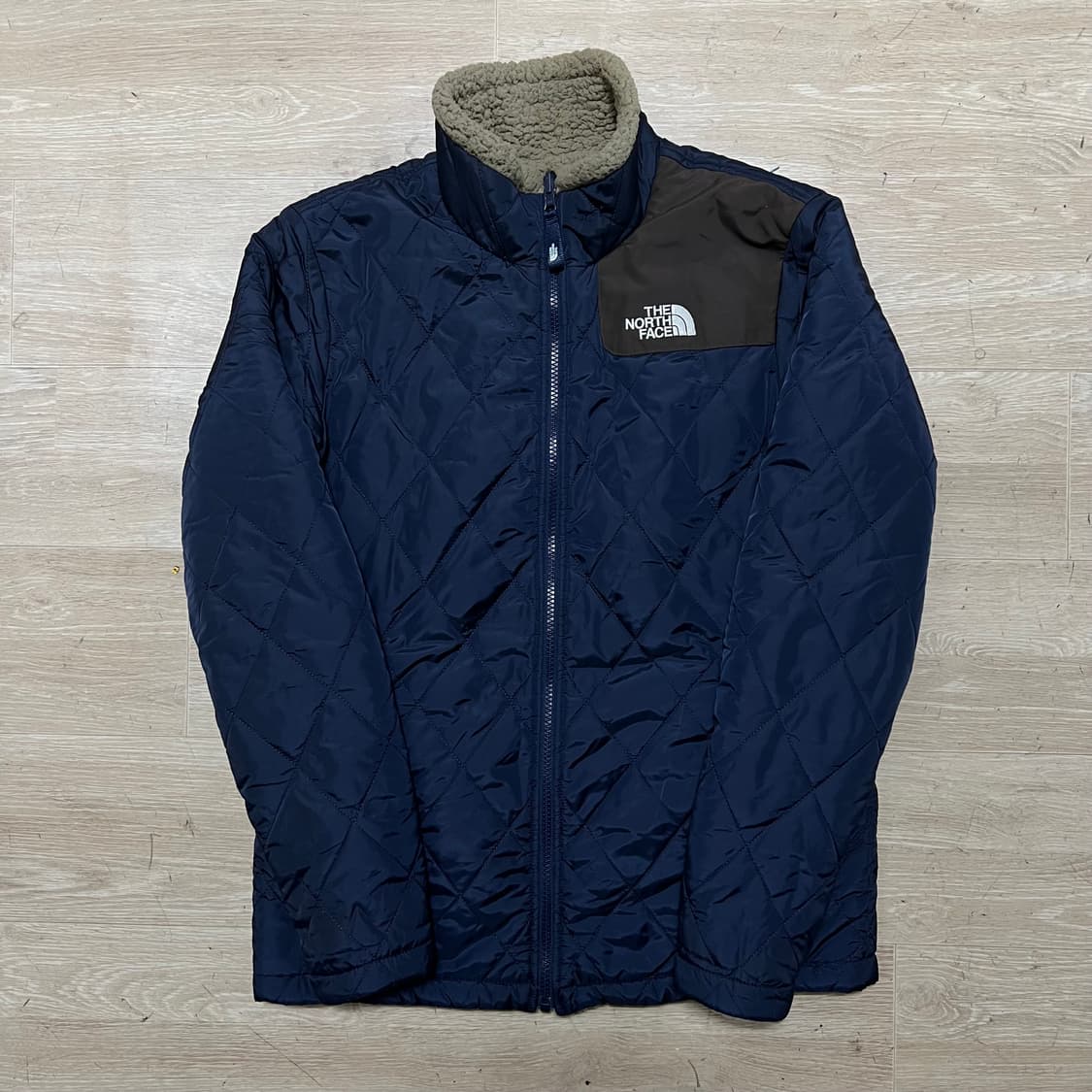 노스페이스 여성 리버시블 뽀글이 후리스 퀼팅점퍼 [네이비] S/90 상품이미지1