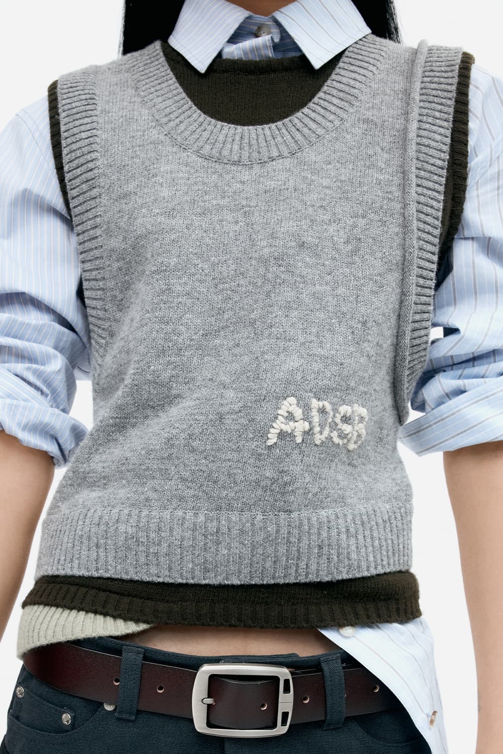 앤더슨벨 레이어드 슬리브리스 니트 탑 상품이미지1