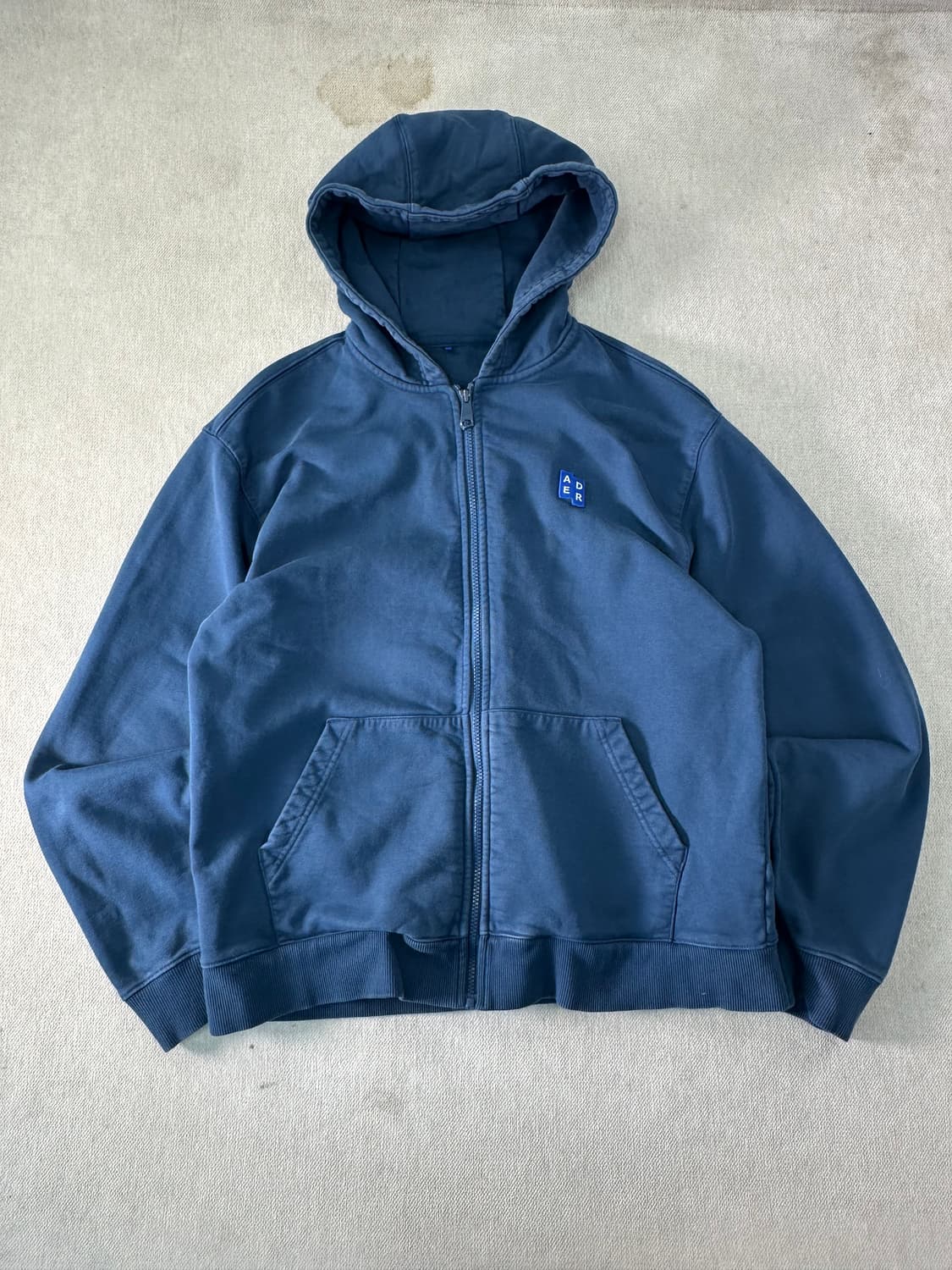 100 아더에러 네이비 후드집업 상품이미지1