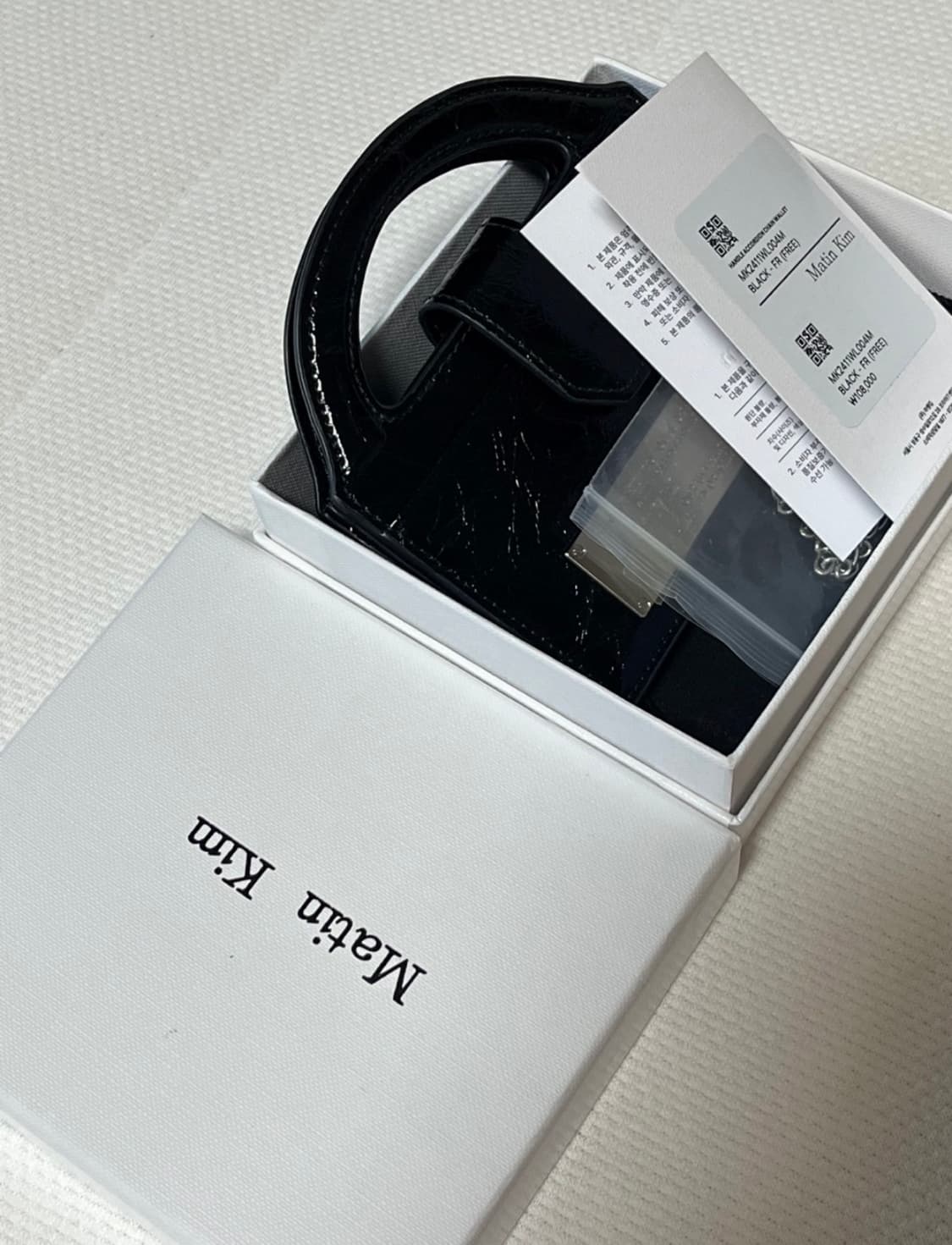 마뗑킴 핸들 아코디언 체인 월렛 상품이미지1