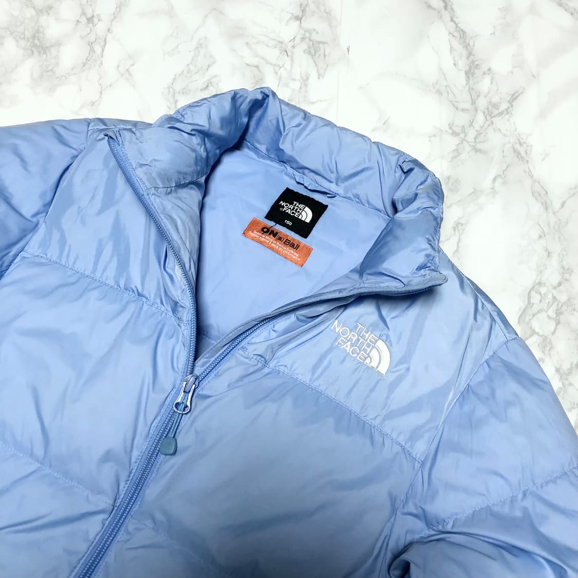 노스페이스 눕시 패딩 자켓 스카이블루 상태굿 상품이미지2