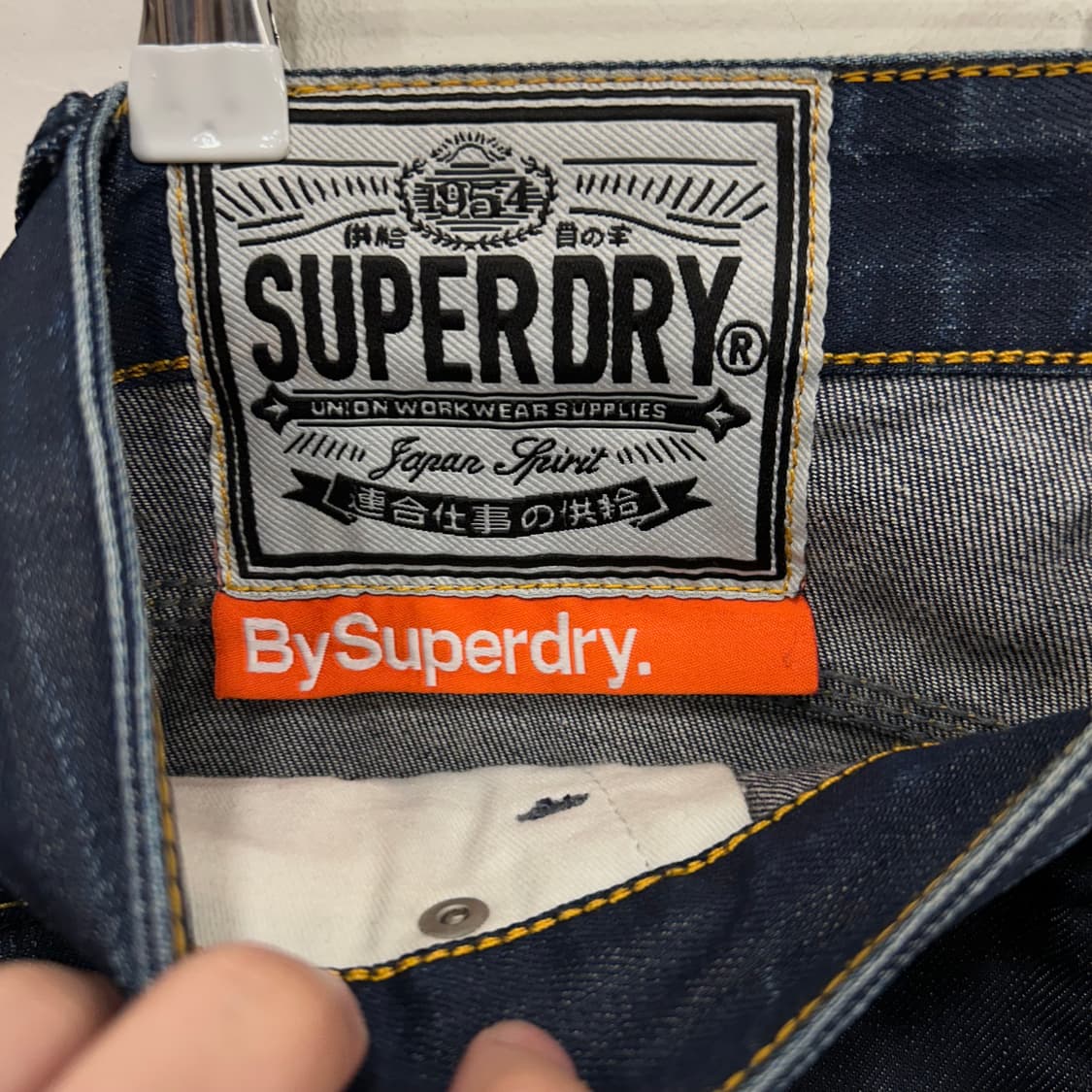 슈퍼드라이 재팬 슬림핏 버튼플라이 코팅 데님진 상품이미지3