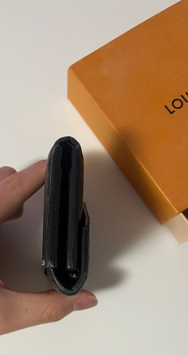 루이비통 앙프렝뜨 조에월릿 반지갑 상품이미지5