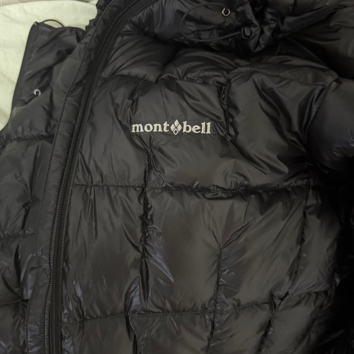 몽벨 플라즈마 1000 알파인 다운 파카 블랙 상품이미지1