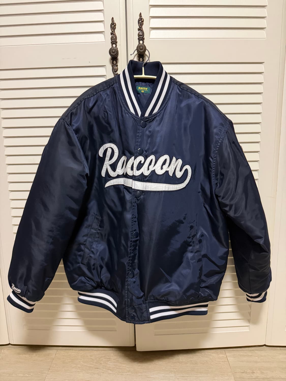 라쿤 바시티 패딩 상품이미지1