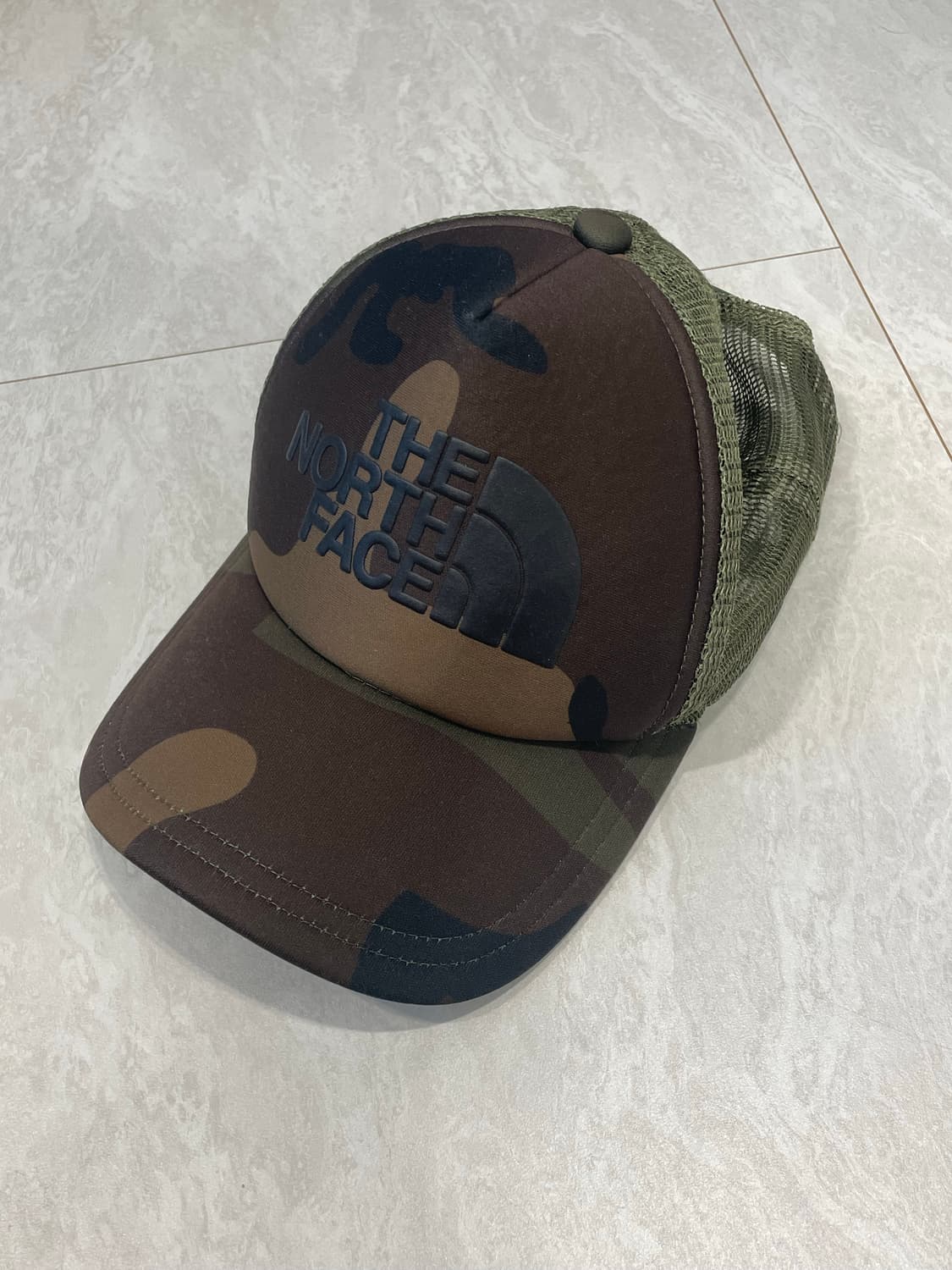 노스페이스(THE NORTH FACE) 우드랜드 카모 로고 트러커 캡 상품이미지1