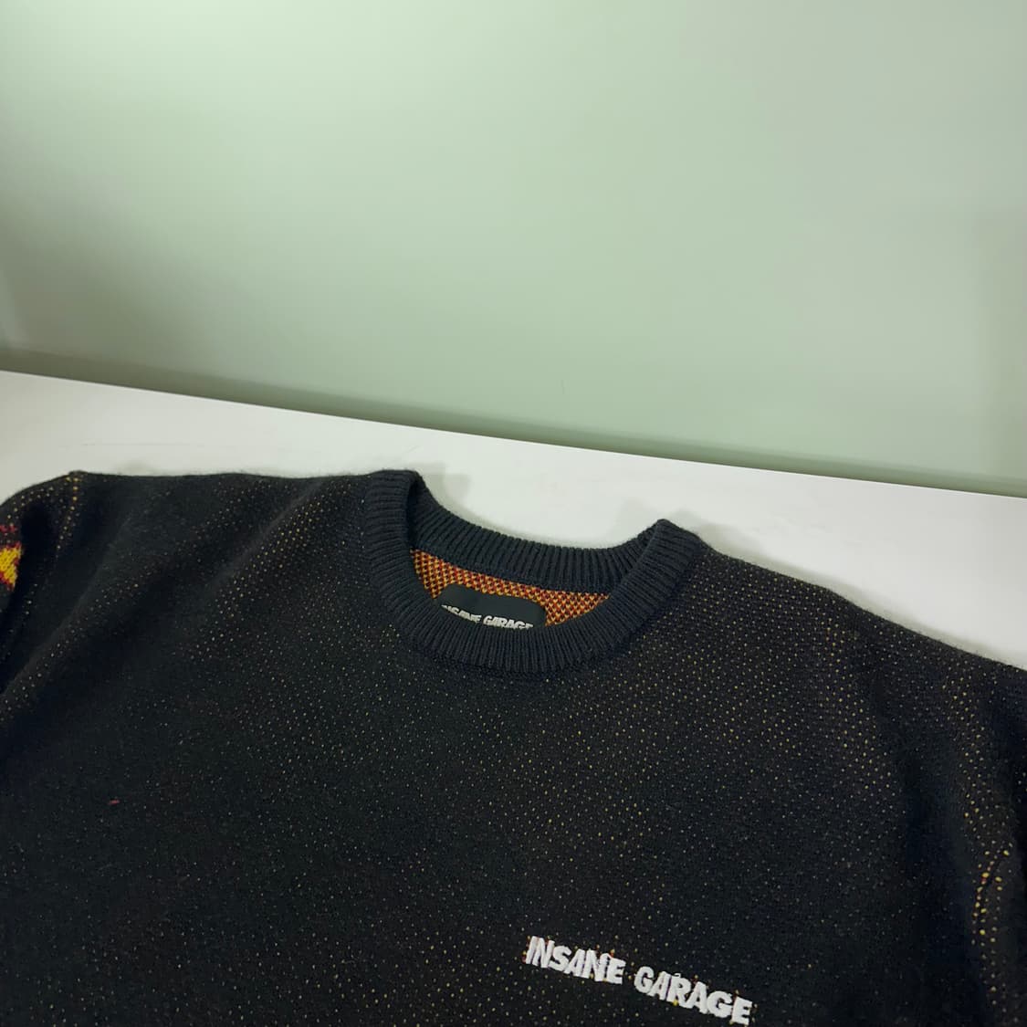 OS 인세인개러지 루즈오버핏 블랙 암로고 울 라운드니트 상품이미지4