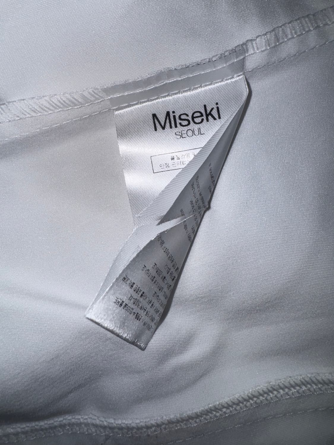 미세키서울 Oblique Button Shirt White 상품이미지2