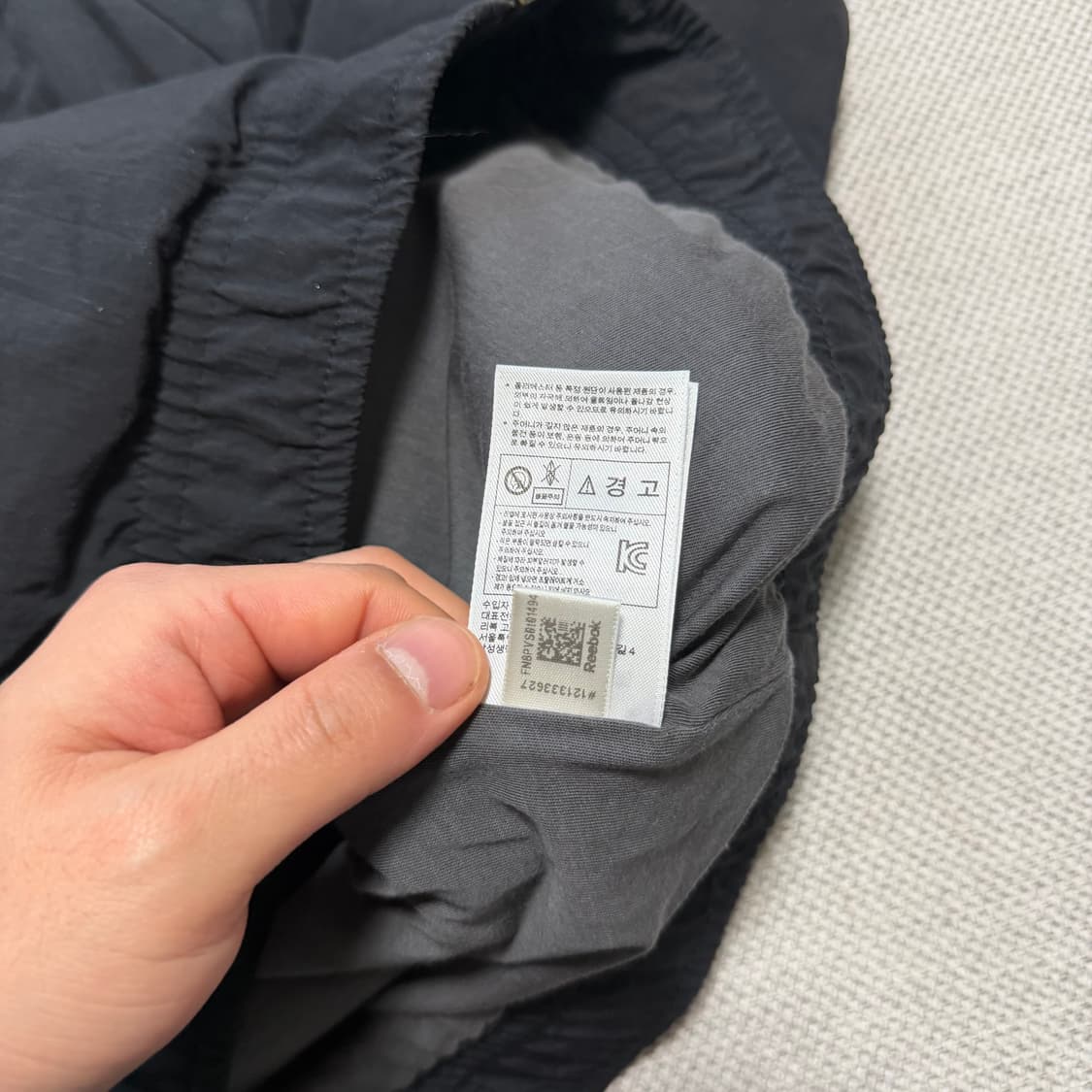 리복 빅로고 패턴 바람막이 자켓 상품이미지5