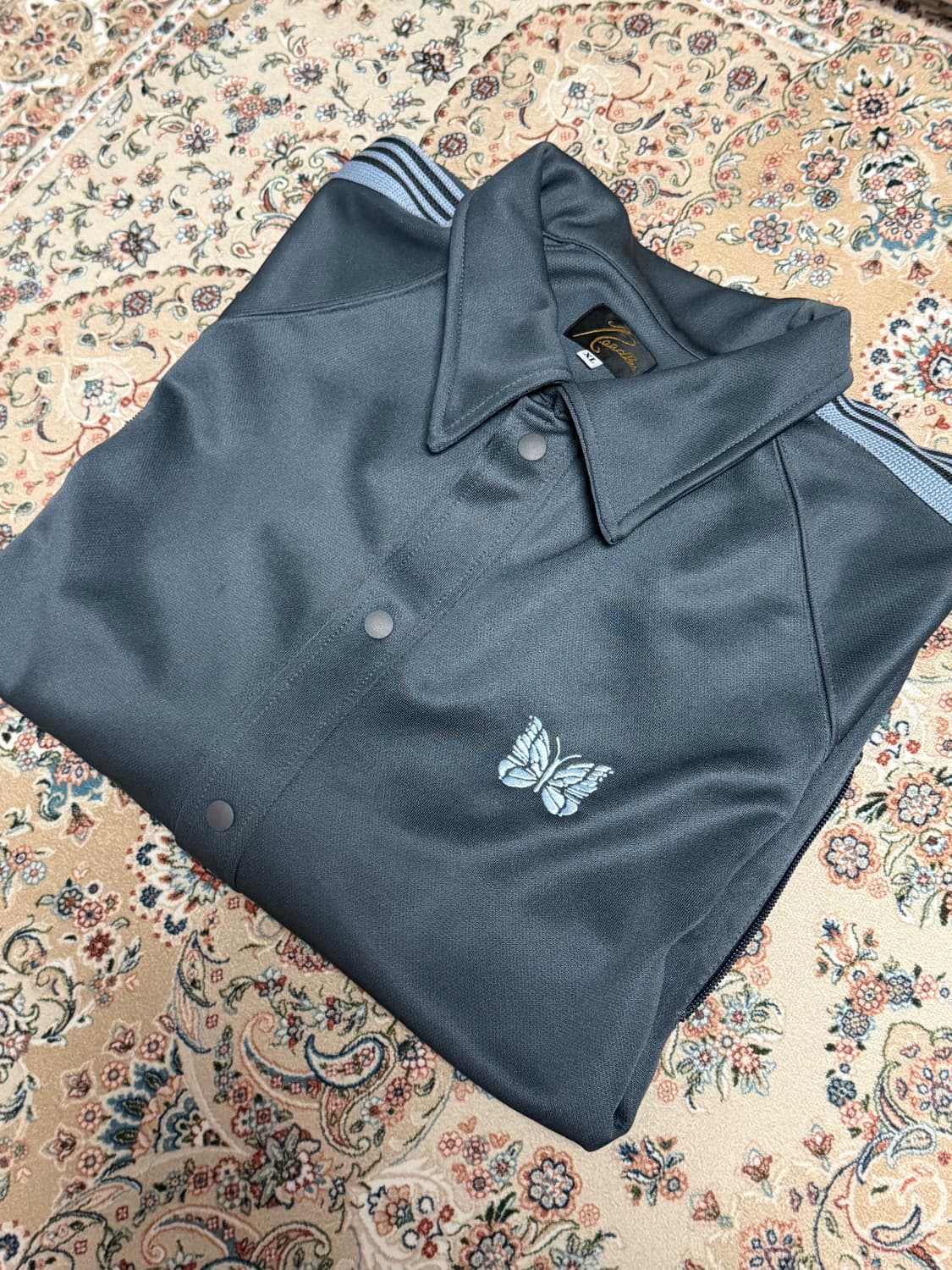 니들스 스튜디오스 별주 트랙 스냅 자켓 상품이미지2