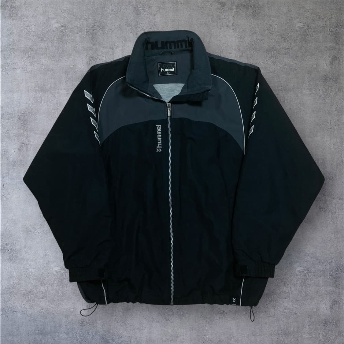 험멜 스몰 로고 사이드 라인 블랙 배색 바람막이 상품이미지1