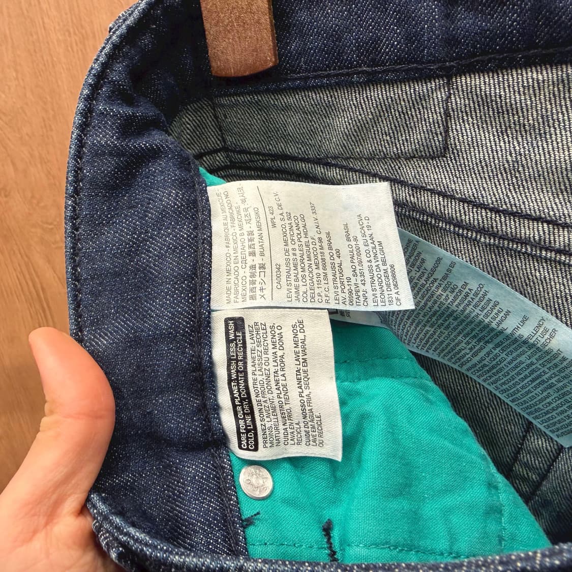 리바이스 511 데님 팬츠 5포켓 레드탭 가죽 패치 디테일 슬림핏 진청 상품이미지6