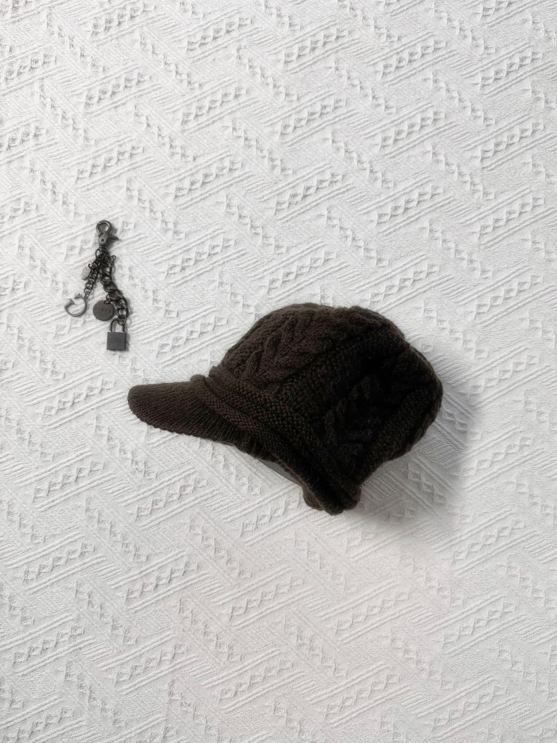 케이블 니트 패턴 셔링 캡 상품이미지1