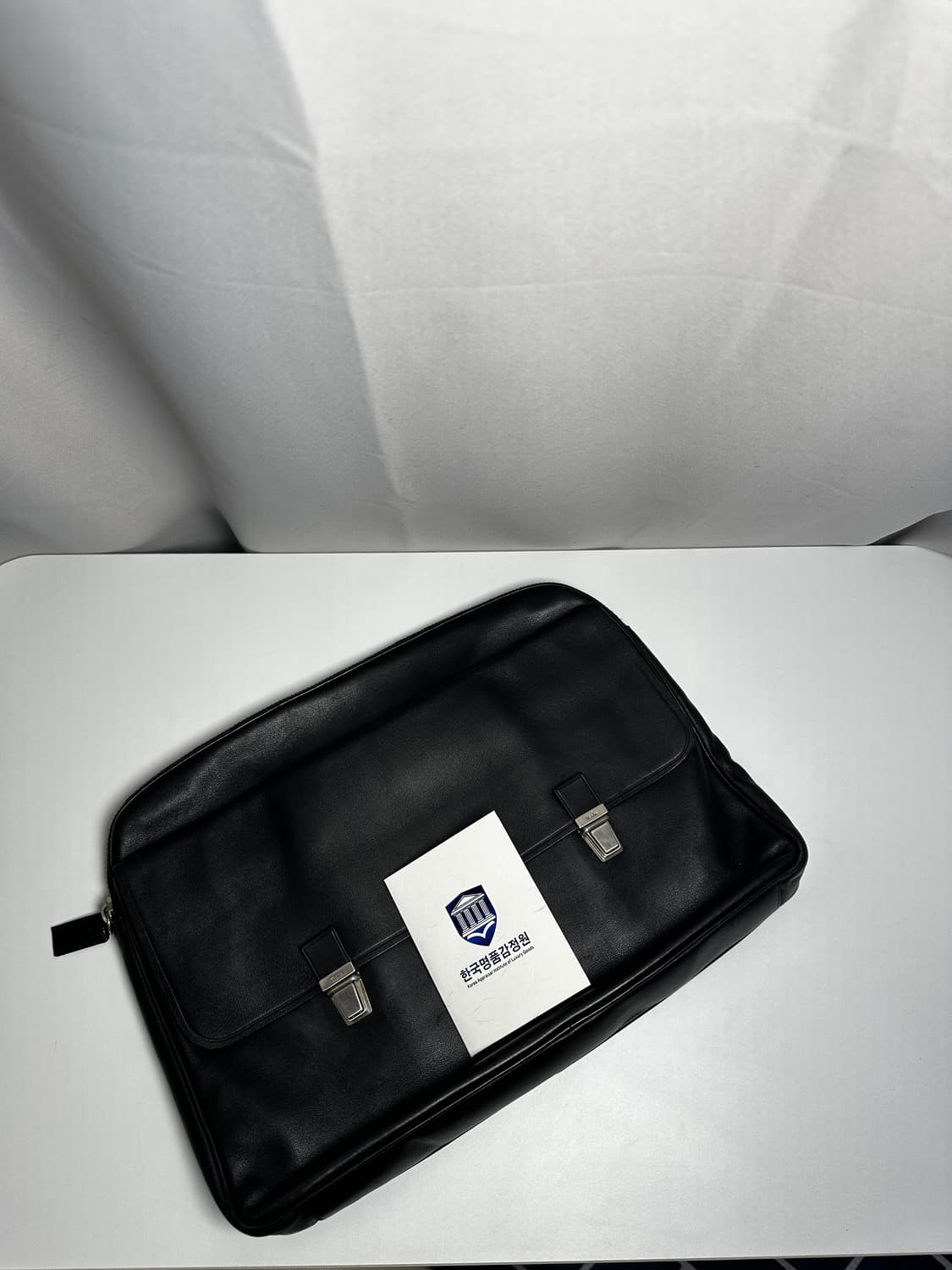 프라다 블랙 카프스킨 슬라이드 핸들 브리프케이스 상품이미지6