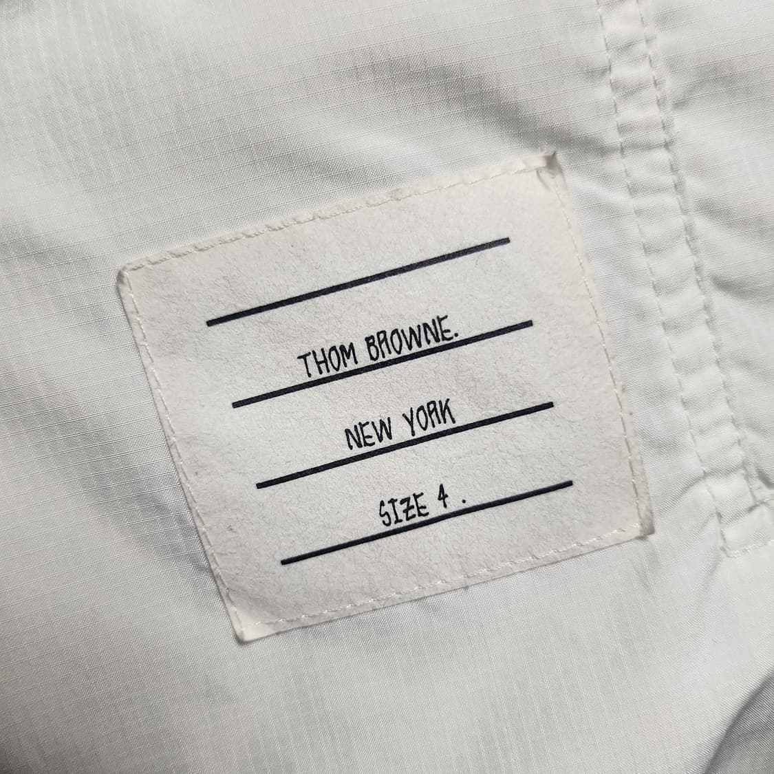 [새상품급]톰브라운 사선완장 립스탑 후드 바람막이 4사이즈 화이트 상품이미지3