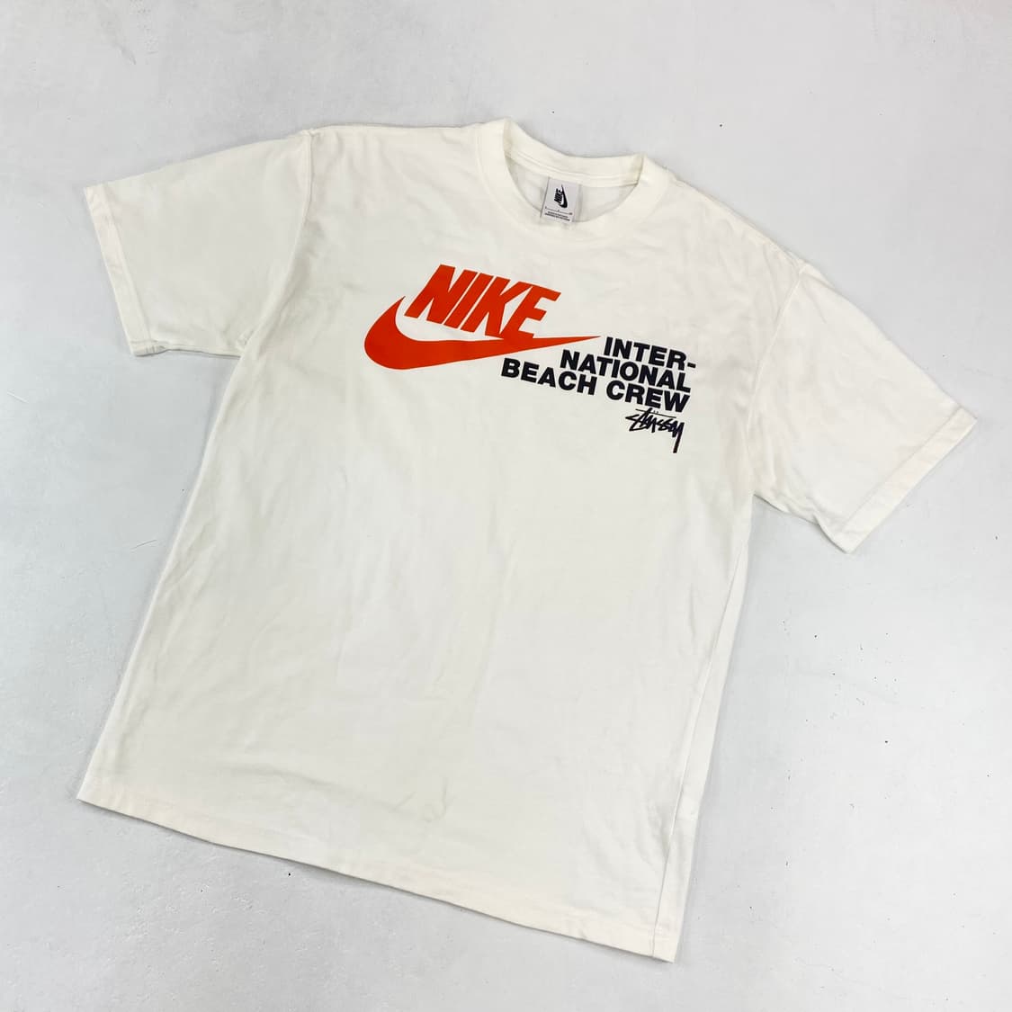 스투시 x 나이키 인터네셔널 비치 크루 하프 티 (95) 상품이미지1