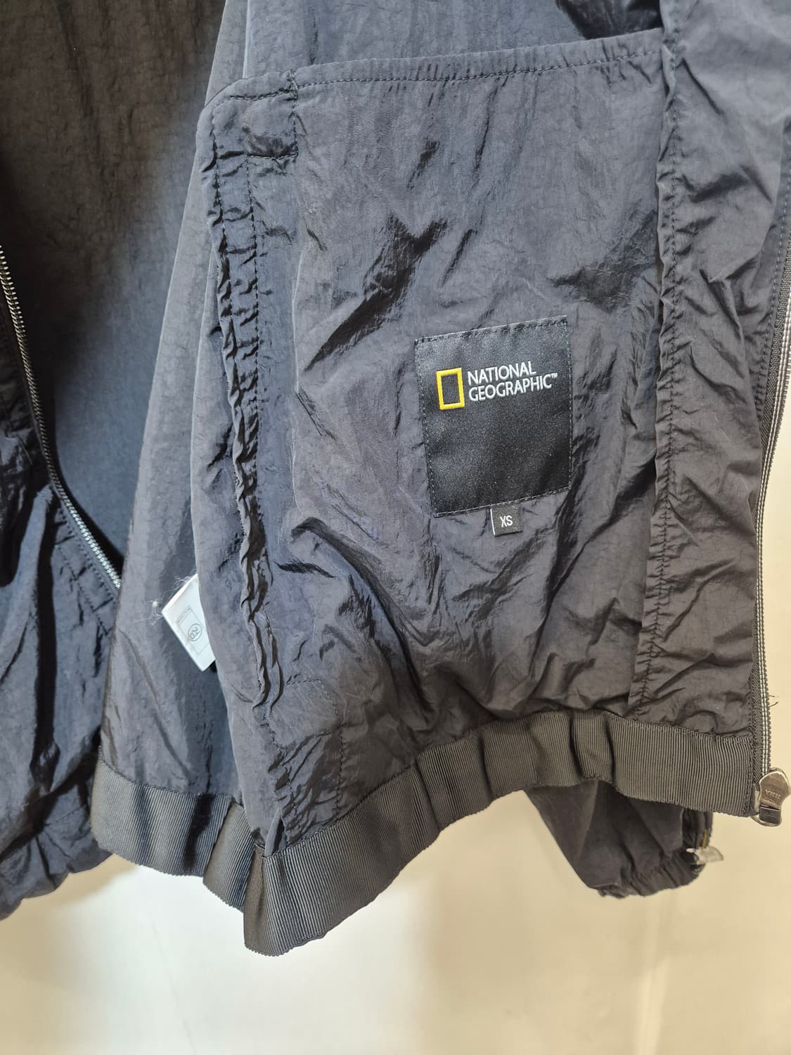 내셔널지오그래픽  블랙 바람막이  xs
사이즈  상품이미지4