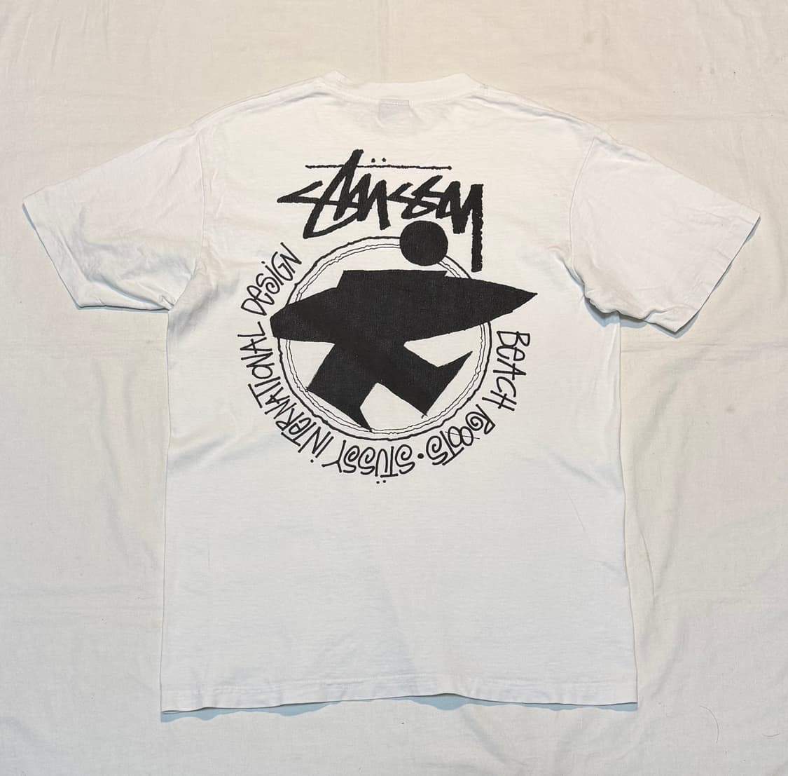 스투시 비치 루트 서프맨 티셔츠 내츄럴 화이트 상품이미지1