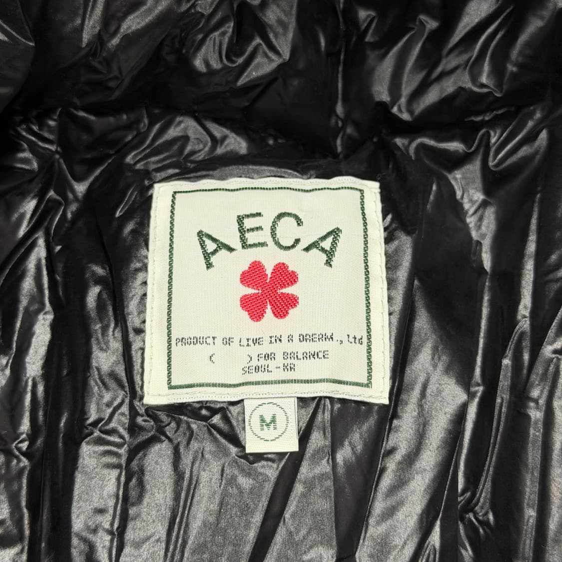 에이카화이트 글로시 덕다운 유광 점퍼 후드 패딩 자켓 블랙 M 상품이미지4