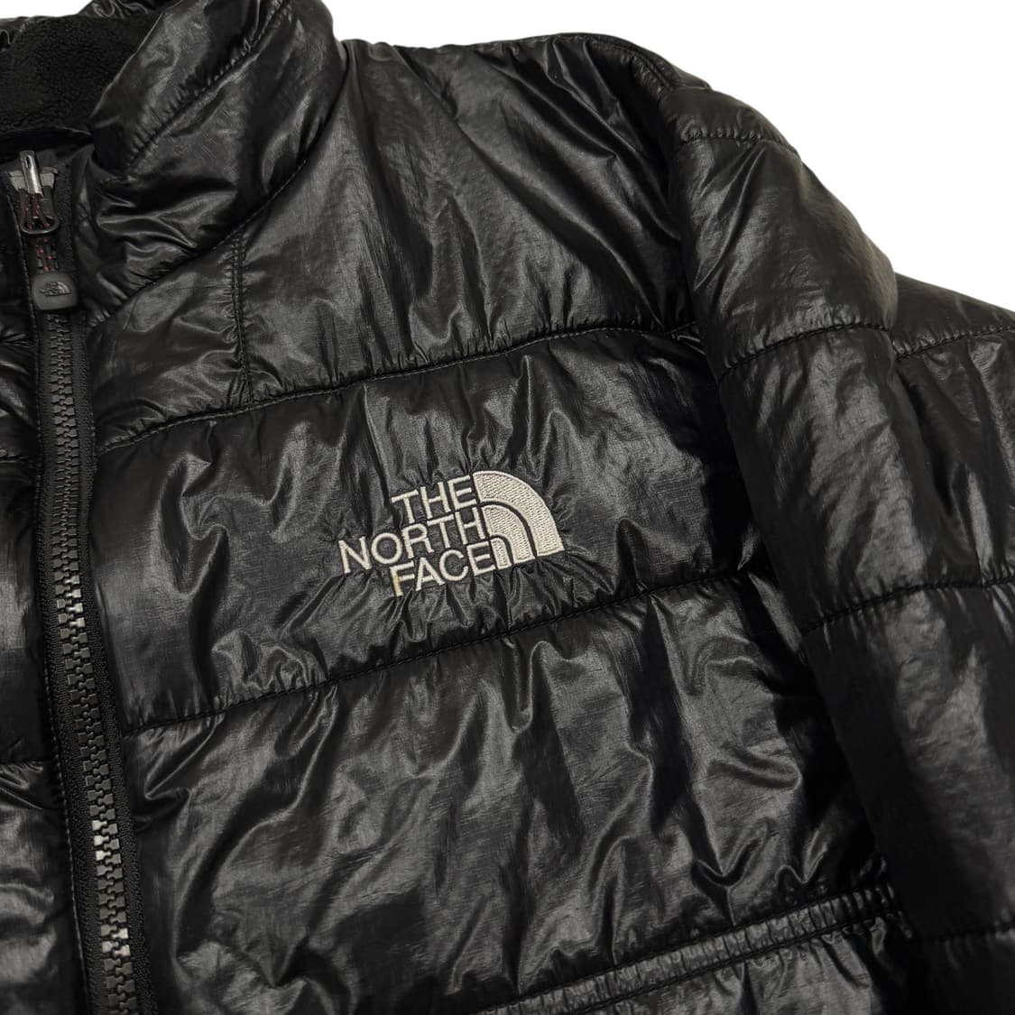노스페이스 퍼텍스 유니카 미드레이어 다운 유광 경량패딩 자켓 블랙 XL 상품이미지2