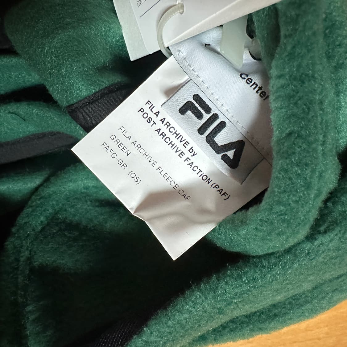 포스트 아카이브 팩션 x 휠라 플리스 이어 플랩 캡 그린 상품이미지4