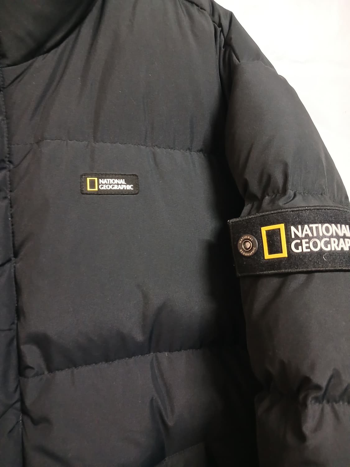 (L,100)내셔널지오그래픽 남성 레이만 숏기장 다운 점퍼 상품이미지4
