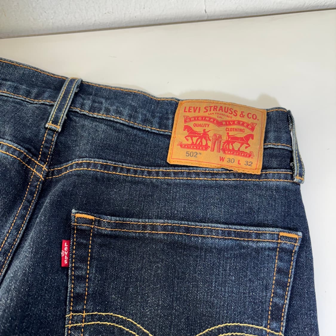 우먼L 리바이스502 진청워시드 레귤러핏 데님팬츠 상품이미지1
