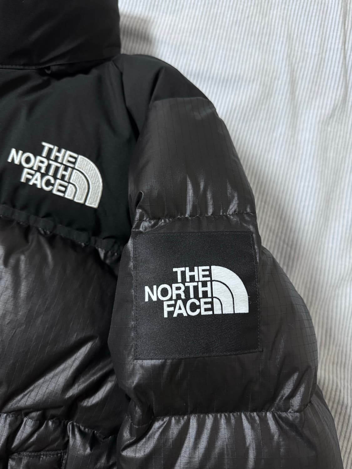 노스페이스 화이트 라벨 노벨티 눕시 다운 자켓 블랙 상품이미지4
