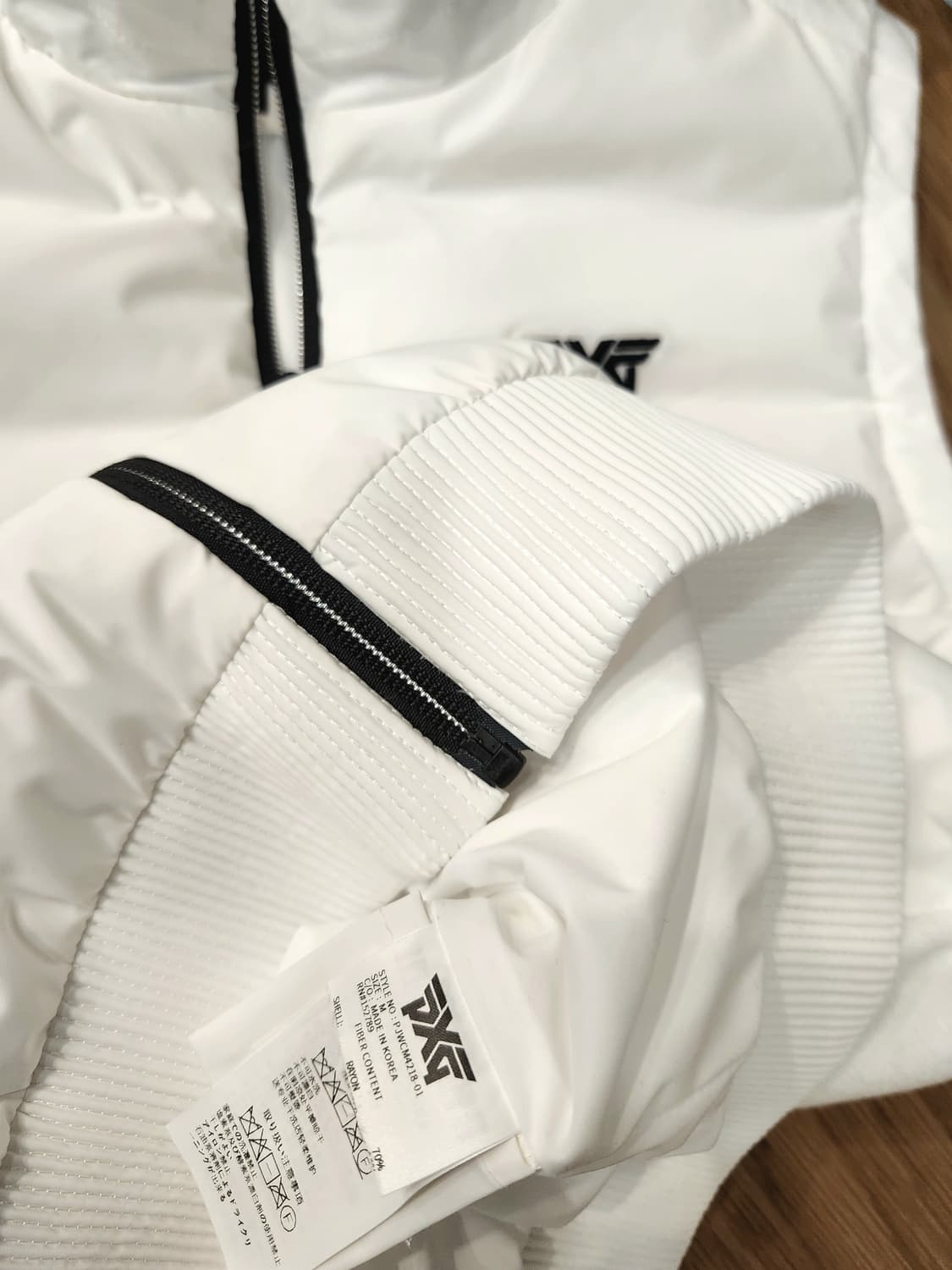 (새상품)PXG 스윙다운 하이브리드 구스니트 베스트 상품이미지7