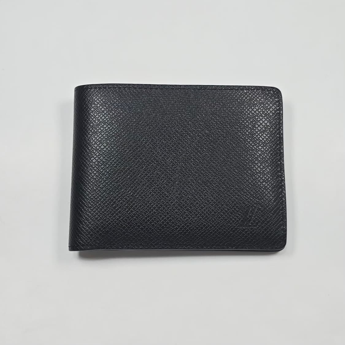 루이비통 멀티플 월렛 타이가 반지갑 상품이미지1