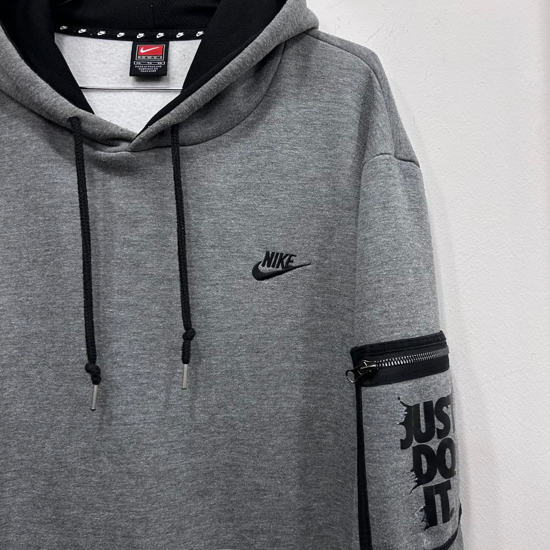 나이키 팀 스우시 슬리브포켓 오버핏 기모 후드티 상품이미지1