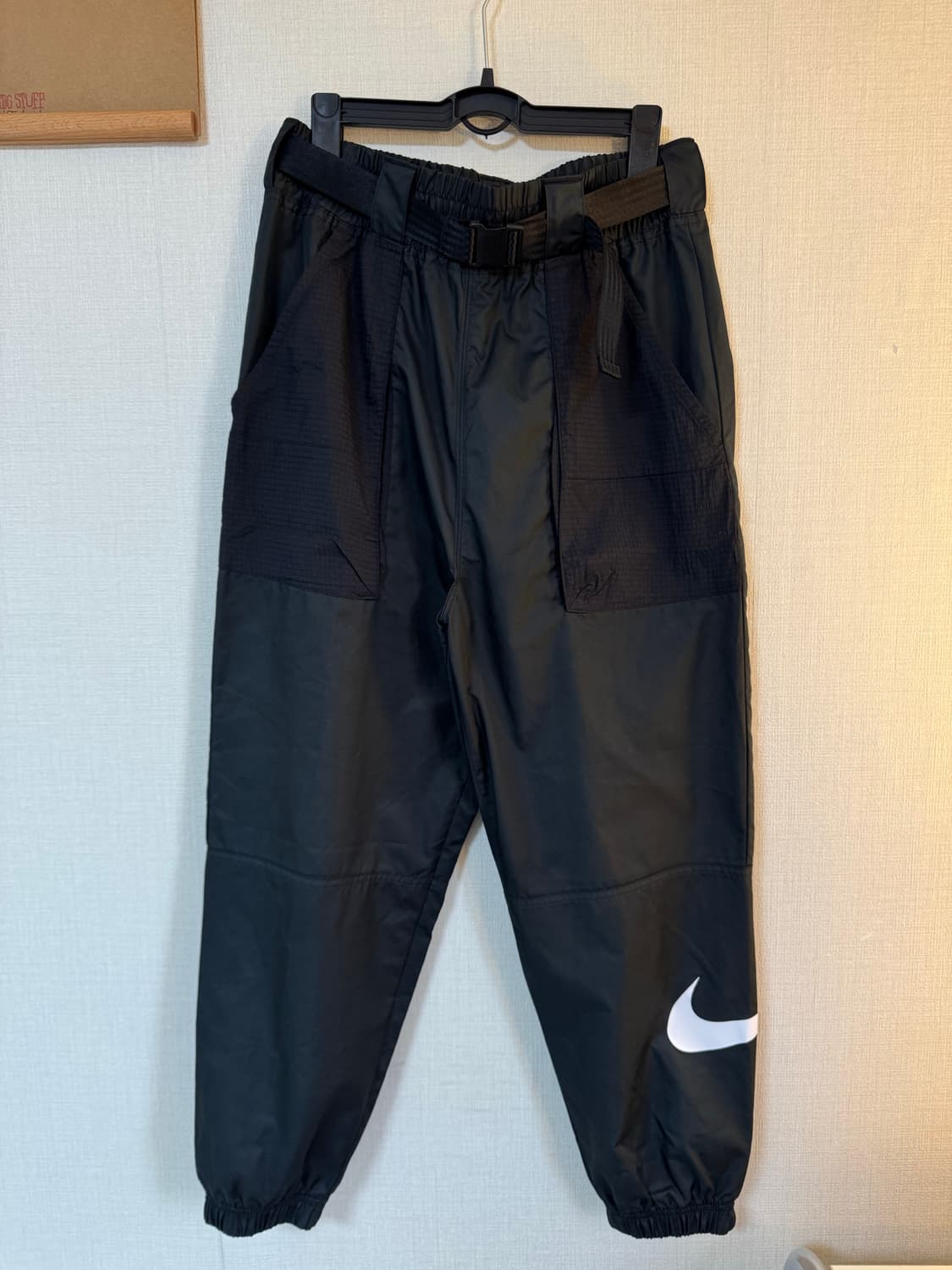 [L]나이키 우먼스 컴포트 스우시 우븐 팬츠 상품이미지1