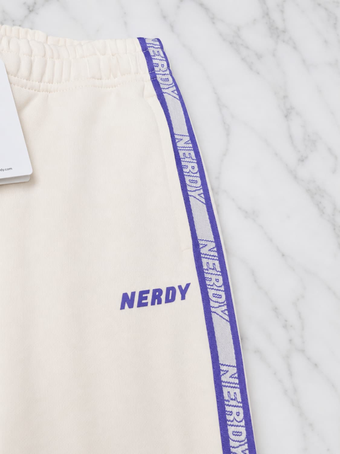 널디 NERDY 로고 테이프 스웨트팬츠 크림 S  상품이미지5