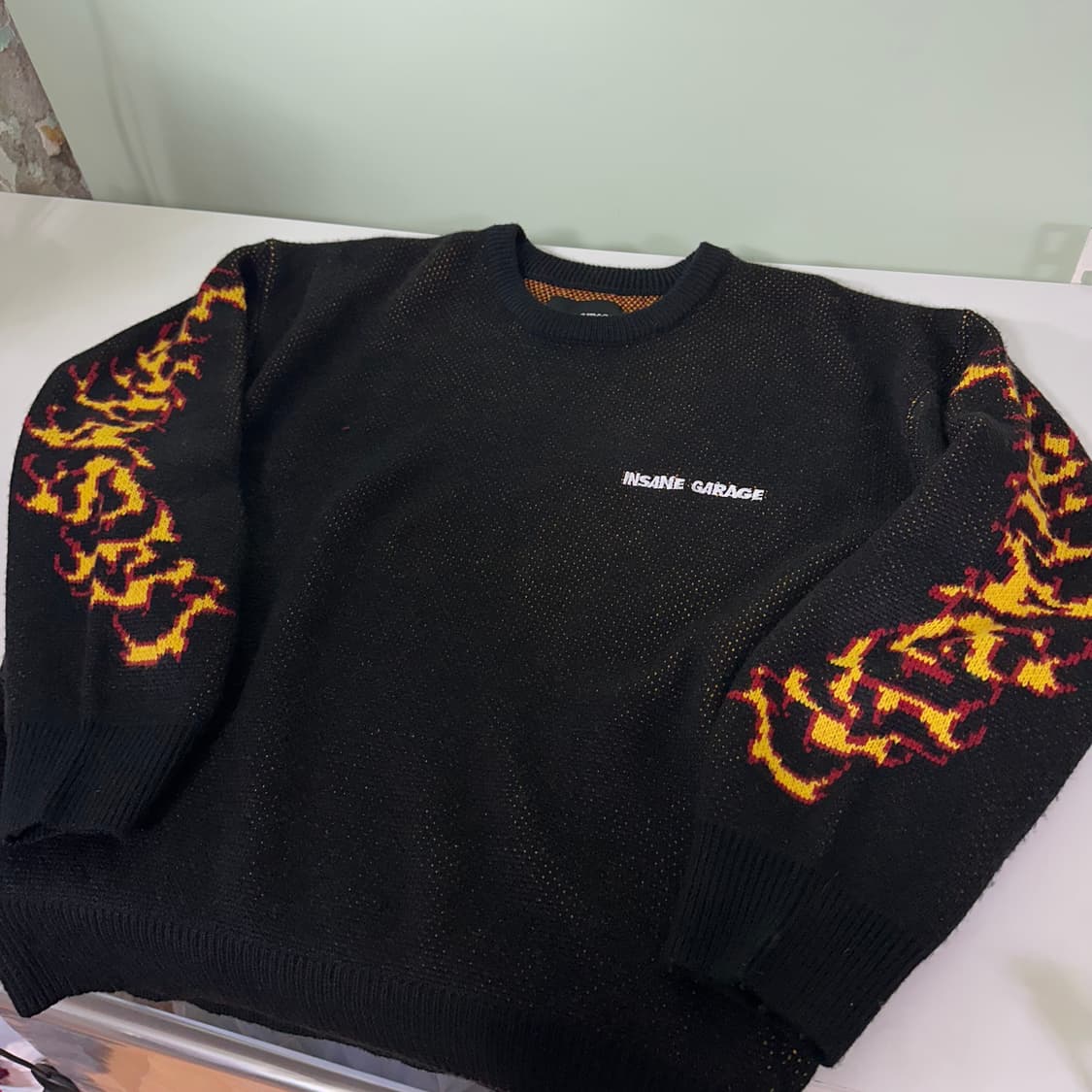 OS 인세인개러지 루즈오버핏 블랙 암로고 울 라운드니트 상품이미지2