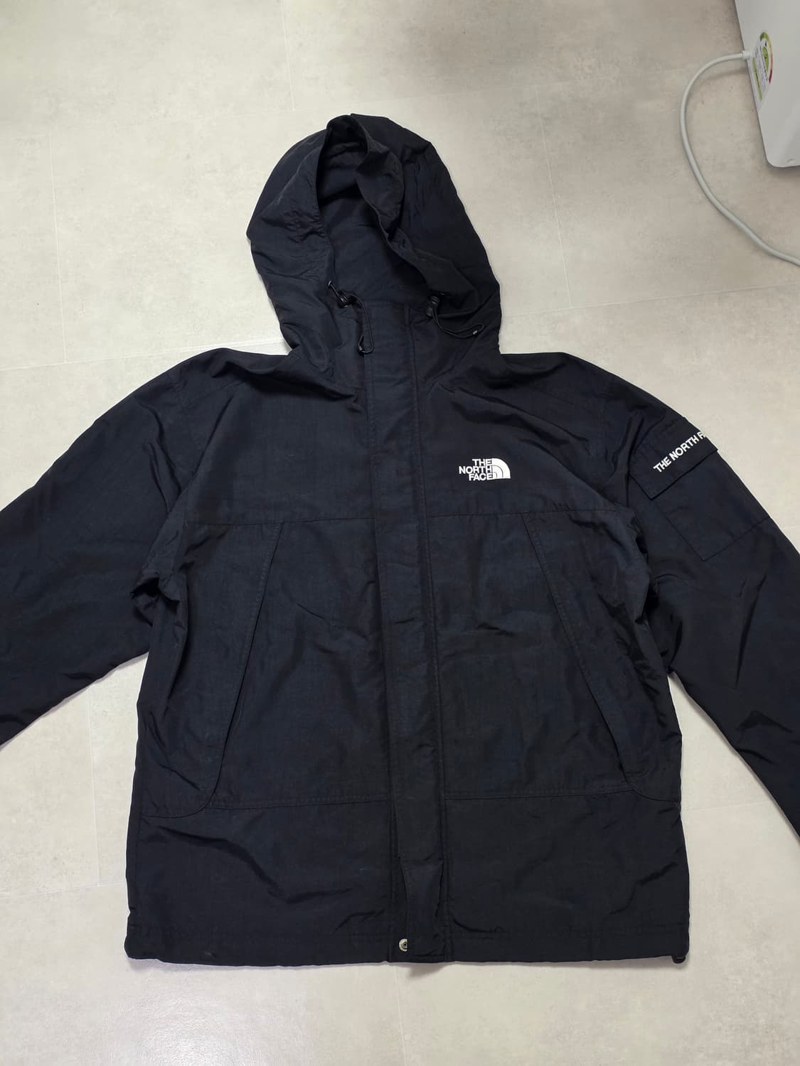 노스페이스 포켓 바람막이 검정 100(L) 상품이미지1