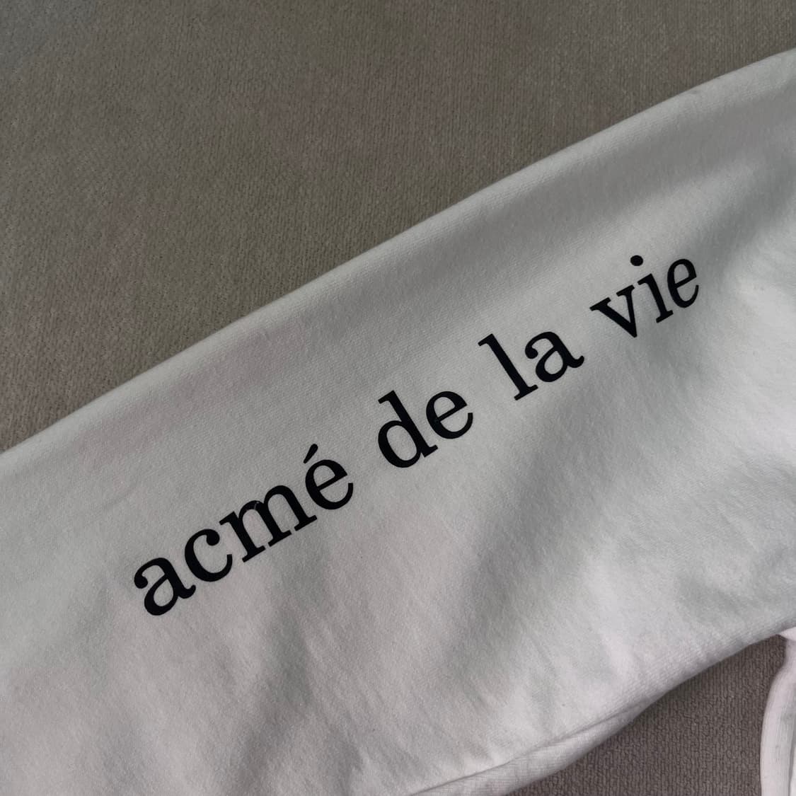 100 아크메드라비 화이트 맨투맨 상품이미지6