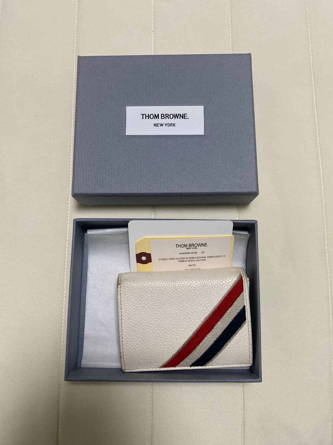 톰브라운 삼선 반지갑 상품이미지1