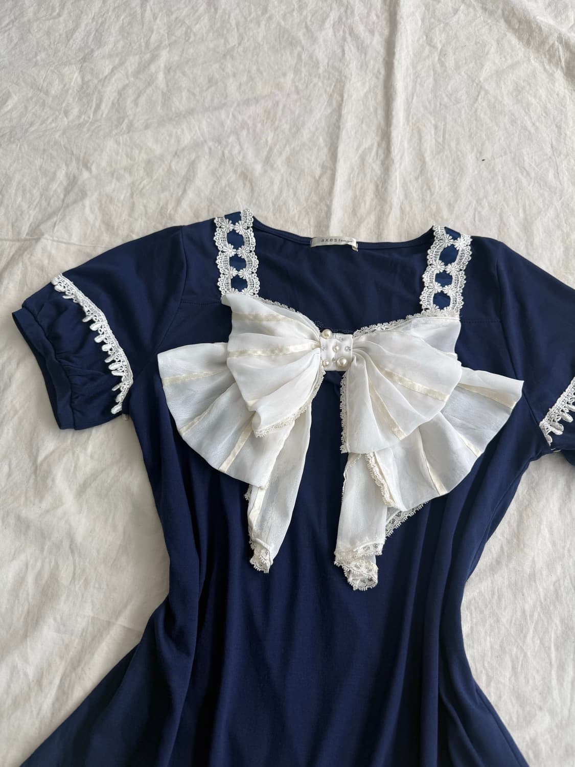 엑시즈팜 네이비 왕리본 로걀 반팔 블라우스 상품이미지1