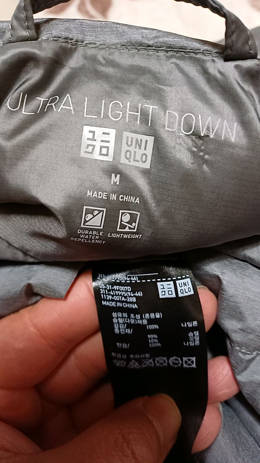 유니클로 오리털 초경량조끼 M 가슴50 기장64 상품이미지5