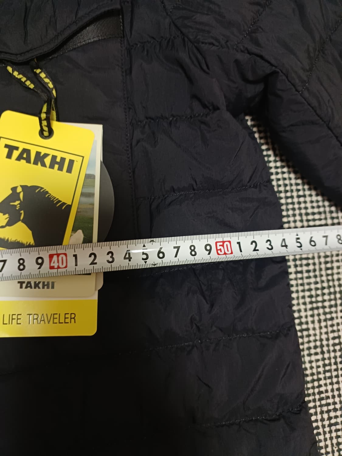 타키(TAKHI)**의 정품 오리털 경량 패딩 재킷  상품이미지8