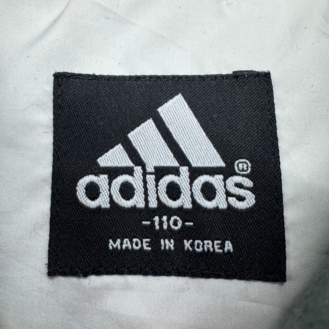 아디다스 00s 올드스쿨 파이어버드 아이보리 조끼패딩 상품이미지5