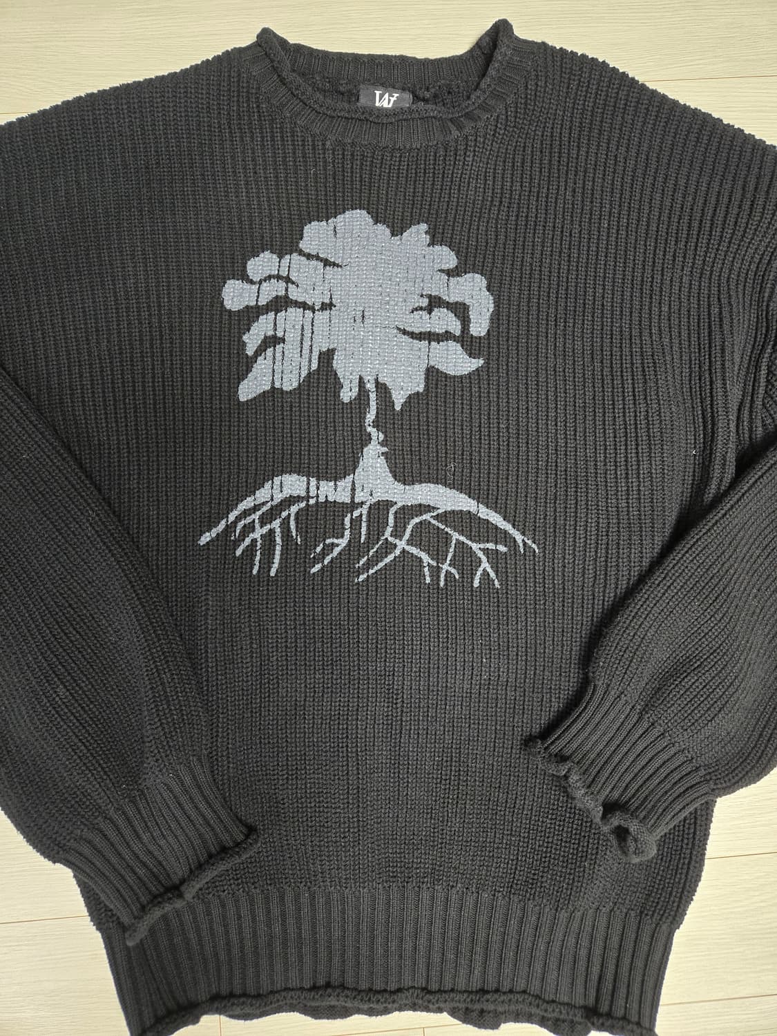  우알롱(Wooalong)의 호프트리 트랙해치 니트 상품이미지1