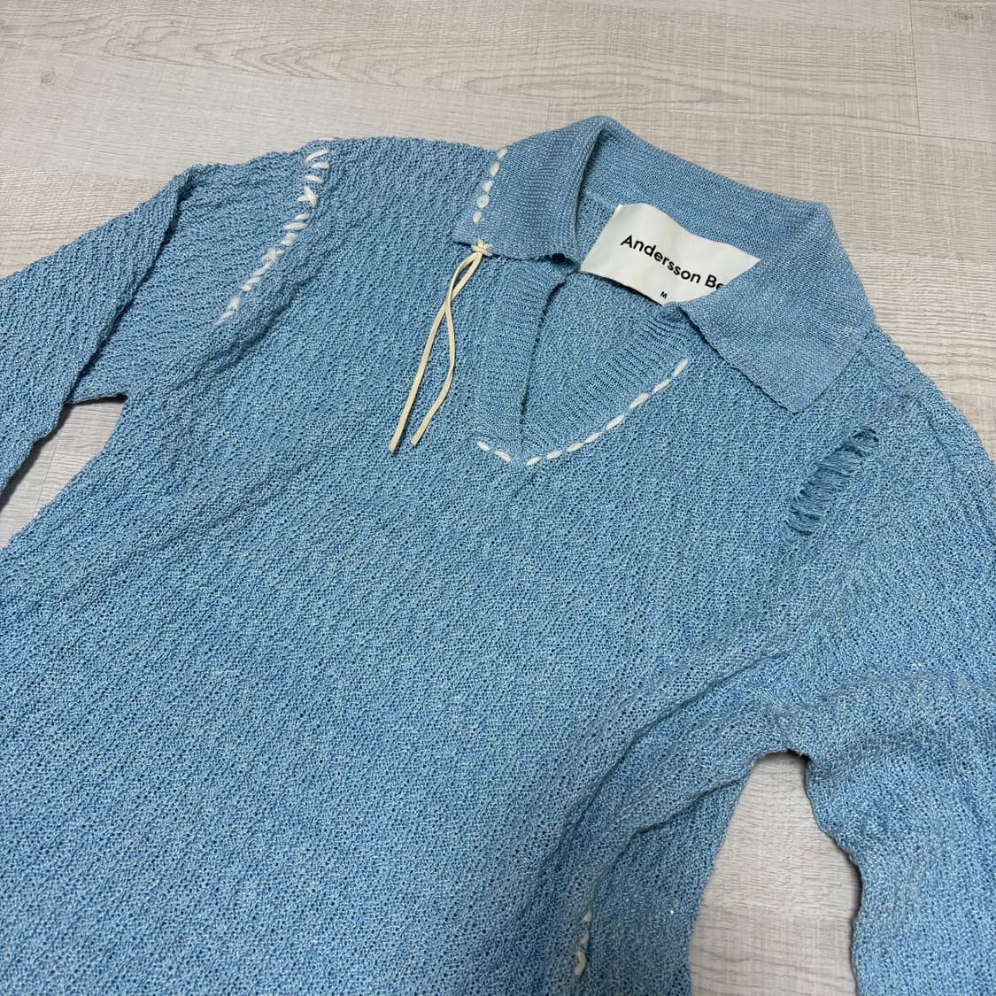 앤더슨벨 데미지 니트 블루 상품이미지1