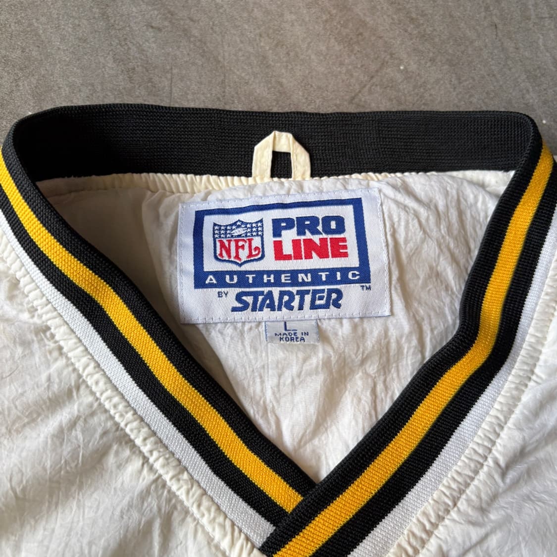 90년대 생산 NFL 프로 라인 바이 스타터 화이트 나일론 웜업 상품이미지4