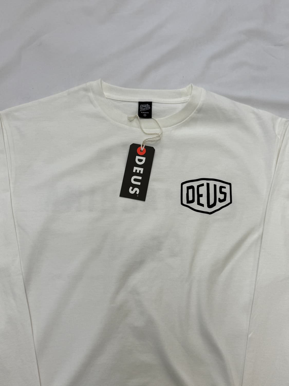 [새상품]Deus데우스 서울 컬리지 긴팔 롱슬리브 티셔츠 흰색 새상품 L 상품이미지4